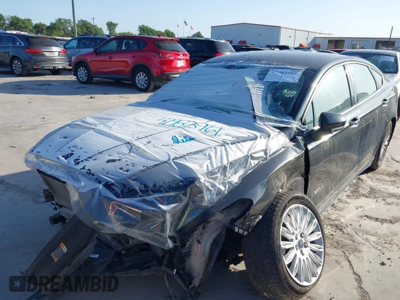 2015 Ford Fusion S Hybrid with VIN 3FA6P0UU9FR106402, listed as a IAAI auction lot 41983961 with 27,122 mi miles. Bid and sale history available at carsss.com. Image 2.
