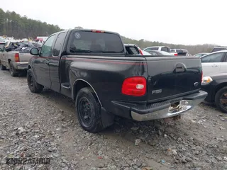 2000 Ford F-150 Work Series with VIN 1FTRX07W7YKA28407, listed as a IAAI auction lot 41551494 with 1 mi miles. Bid and sale history available at carsss.com. Image 3.