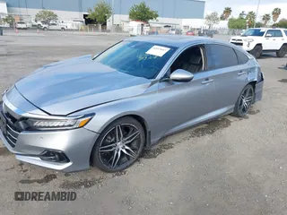 2021 Honda Accord Touring z VIN 1HGCV2F99MA032916, wystawiony jako IAAI lot #42019607 z przebiegiem 64 344 mil mil oraz . Historia ofert i sprzedaży dostępna na DreamBid. Obrazek 18.