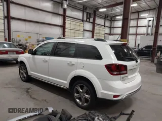 2017 Dodge Journey Crossroad Plus with VIN 3C4PDDGG6HT595397, listed as a IAAI auction lot 42231328 with 125,861 mi miles and . Bid and sale history available at DreamBid. Image 3.