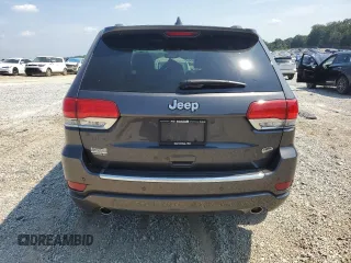 2018 Jeep Grand Cherokee High Altitude with VIN 1C4RJECG8JC239080, listed as a Copart auction lot 62141205 with 66,126 mi miles and Salvage title. Bid and sale history available at DreamBid. Image 6.