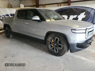 2022 Rivian R1T Launch Edition z VIN 7FCTGAAL7NN006406, wystawiony jako Copart lot #60049275 z przebiegiem 1 517 mil mil oraz Czysty tytuł • Clean title. Historia ofert i sprzedaży dostępna na DreamBid. Obrazek 1.