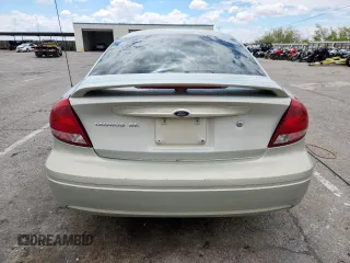 2006 Ford Taurus SE с VIN 1FAFP53U36A203006, выставлен на аукционе Copart как лот 63012895 с пробегом Не указан миль и Списание • Salvage title. История ставок и продаж доступна на DreamBid. Изображение 6.