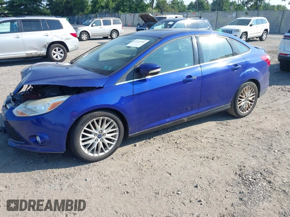 2014 Ford Focus Titanium with VIN 1FADP3J26EL179266, listed as a IAAI auction lot 42712701 with 157,897 mi miles and . Bid and sale history available at DreamBid. Image 2.