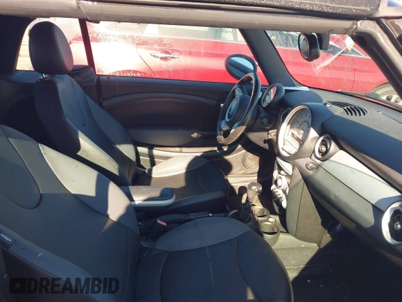 2009 MINI Convertible with VIN WMWMR33569TU95961, listed as a IAAI auction lot 41689845 with 107,934 mi miles and . Bid and sale history available at DreamBid. Image 5.