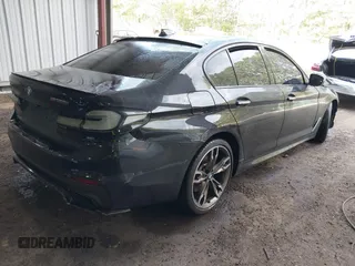 2018 BMW 5 Series M550i xDrive with VIN WBAJB9C51JB035949, listed as a IAAI auction lot 42085727 with Not provided miles and . Bid and sale history available at DreamBid. Image 4.