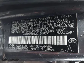2013 Toyota Prius c One with VIN JTDKDTB32D1548295, listed as a IAAI auction lot 41768516 with 104,708 mi miles. Bid and sale history available at carsss.com. Image 9.