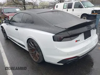 2018 Audi RS 5 z VIN WUAPWAF5XJA905043, wystawiony jako IAAI lot #41978868 z przebiegiem 60 838 mil mil oraz . Historia ofert i sprzedaży dostępna na DreamBid. Obrazek 3.