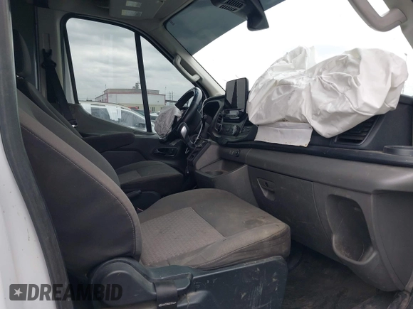 2020 Ford Transit Cargo with VIN 1FTBW3XG2LKB18281, listed as a IAAI auction lot 42022187 with 84,323 mi miles. Bid and sale history available at carsss.com. Image 5.