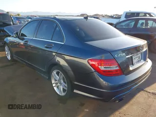 2014 Mercedes-Benz C-Class C 250 Sport with VIN WDDGF4HB1EG239751, listed as a IAAI auction lot 39149563 with 103,454 mi miles. Bid and sale history available at carsss.com. Image 3.