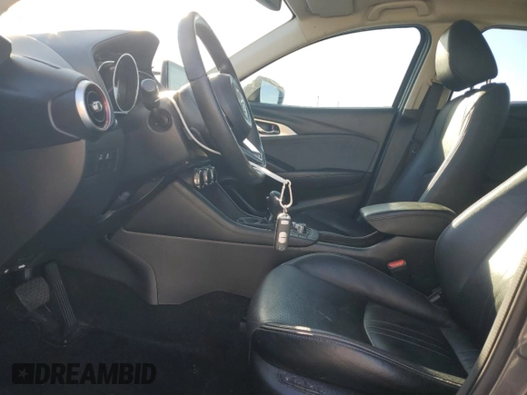 2019 Mazda CX-3 Grand Touring with VIN JM1DKFD77K0447529, listed as a Copart auction lot 43562565 with 57,321 mi miles and Salvage Title. Bid and sale history available at DreamBid. Image 7.