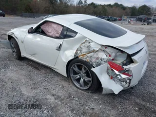 2012 Nissan 370Z Touring with VIN JN1AZ4EH4CM565125, listed as a IAAI auction lot 41630602 with 121,823 mi miles. Bid and sale history available at carsss.com. Image 3.