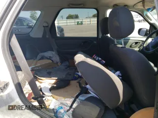 2004 Ford Escape XLS with VIN 1FMYU021X4DA07352, listed as a Copart auction lot 68909864 with 275,776 mi miles and Salvage Title. Bid and sale history available at carsss.com. Image 11.