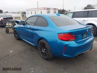 2021 BMW M2 Competition with VIN WBS2U7C02M7H63454, listed as a IAAI auction lot 41063808 with 15,047 mi miles. Bid and sale history available at carsss.com. Image 3.