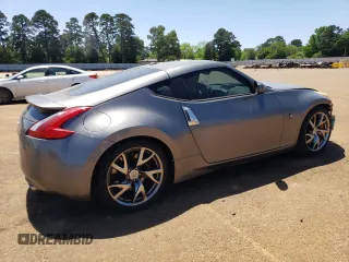 2014 Nissan 370Z Nismo with VIN JN1AZ4EH7EM633324, listed as a Copart auction lot 53812335 with 57,856 mi miles and Salvage Title. Bid and sale history available at DreamBid. Image 3.