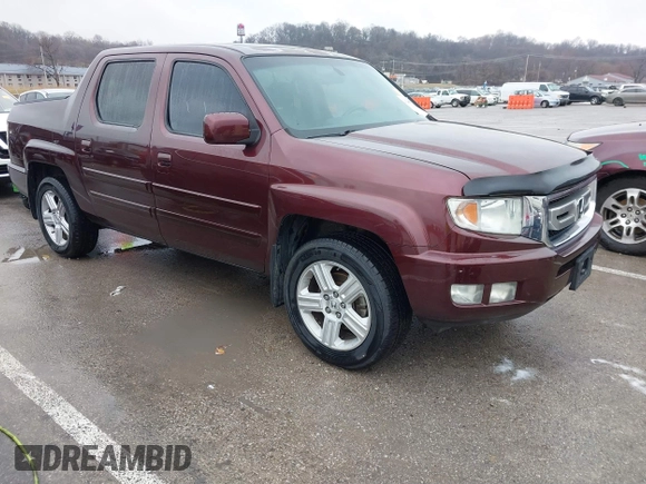 2009 Honda Ridgeline RTL with VIN 5FPYK16529B100032, listed as a IAAI auction lot 41206781 with 130,694 mi miles and . Bid and sale history available at DreamBid. Image 1.