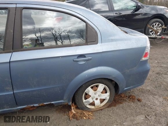 2007 Chevrolet Aveo LS with VIN KL1TD56667B175174, listed as a IAAI auction lot 42012342 with 100,534 mi miles and . Bid and sale history available at DreamBid. Image 6.