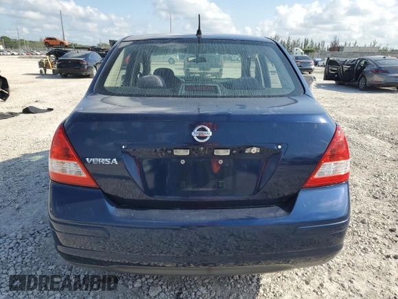 2009 Nissan Versa 1.6 z VIN 3N1CC11E49L499117, wystawiony jako Copart lot #56486285 z przebiegiem 129 114 mil mil oraz Szkoda całkowita • Salvage title. Historia ofert i sprzedaży dostępna na DreamBid. Obrazek 6.