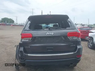 2017 Jeep Grand Cherokee Limited z VIN 1C4RJFBG9HC849409, wystawiony jako IAAI lot #42275162 z przebiegiem 98 800 mil mil oraz . Historia ofert i sprzedaży dostępna na DreamBid. Obrazek 4.