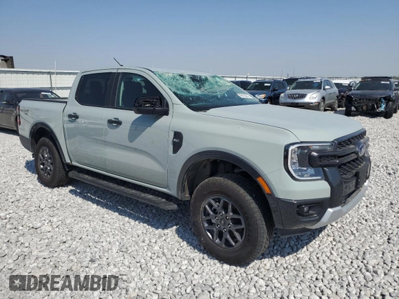 2024 Ford Ranger XLT with VIN 1FTER4HHXRLE47525, listed as a Copart auction lot 49102215 with 6,682 mi miles and Salvage Title. Bid and sale history available at DreamBid. Image 4.