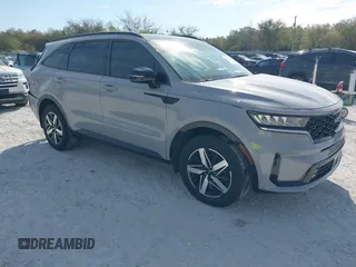 2023 Kia Sorento EX z VIN 5XYRH4LF9PG229689, wystawiony jako IAAI lot #41893442 z przebiegiem 17 906 mil mil oraz . Historia ofert i sprzedaży dostępna na DreamBid. Obrazek 1.