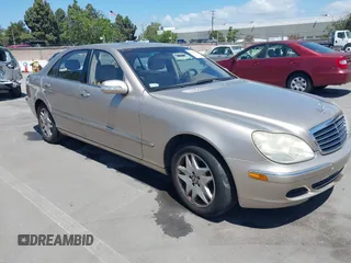 2003 Mercedes-Benz S-Class 4.3L with VIN WDBNG70J73A377067, listed as a IAAI auction lot 42137032 with 122,938 mi miles. Bid and sale history available at carsss.com. Image 1.