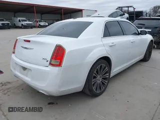 2013 Chrysler 300 with VIN 2C3CCABG5DH711719, listed as a IAAI auction lot 41383018 with 191,863 mi miles. Bid and sale history available at carsss.com. Image 4.