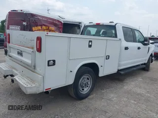 2022 Ford Super Duty F-250 SRW XL with VIN 1FD7W2B63NEF35601, listed as a IAAI auction lot 42159378 with 133,799 mi miles. Bid and sale history available at carsss.com. Image 4.