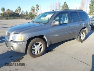 2005 GMC Envoy SLT with VIN 1GKDT13S152373799, listed as a IAAI auction lot 41537512 with 187,750 mi miles. Bid and sale history available at carsss.com. Image 2.