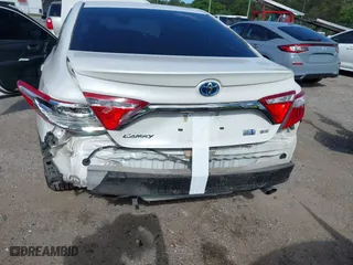 2015 Toyota Camry Hybrid LE with VIN 4T1BD1FK7FU142175, listed as a IAAI auction lot 41958486 with 120,013 mi miles. Bid and sale history available at carsss.com. Image 6.