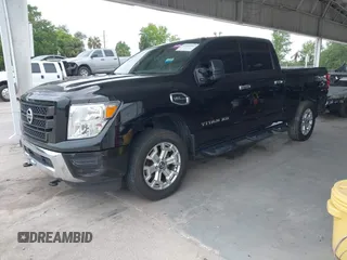 2020 Nissan Titan Platinum Reserve with VIN 1N6AA1FB3LN503641, listed as a IAAI auction lot 42395997 with 177,362 mi miles and . Bid and sale history available at DreamBid. Image 2.