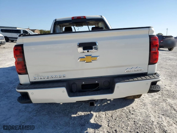 2015 Chevrolet Silverado 1500 High Country with VIN 3GCUKTEC7FG134945, listed as a Copart auction lot 77397654 with 0 mi miles and Salvage Title. Bid and sale history available at carsss.com. Image 6.