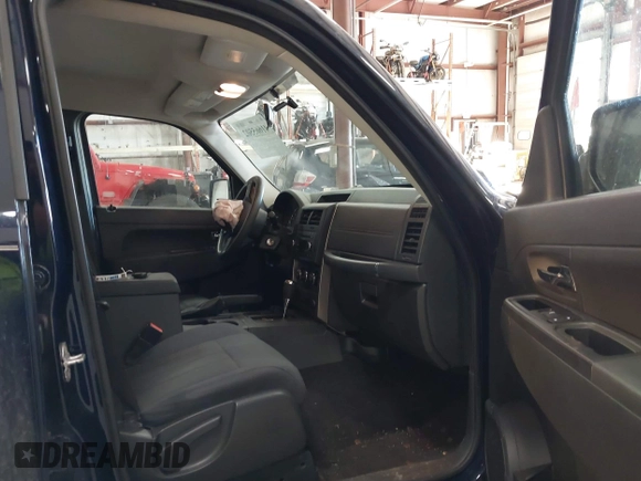 2012 Jeep Liberty Sport z VIN 1C4PJMAK9CW158308, wystawiony jako IAAI lot #41665502 z przebiegiem 125 595 mil mil oraz . Historia ofert i sprzedaży dostępna na DreamBid. Obrazek 5.