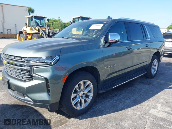 2023 Chevrolet Suburban Premier z VIN 1GNSCFKD4PR378869, wystawiony jako IAAI lot #41802386 z przebiegiem 58 569 mil mil oraz . Historia ofert i sprzedaży dostępna na DreamBid. Obrazek 2.