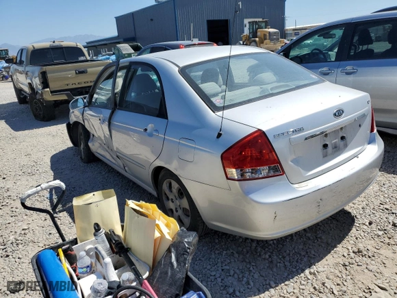 2009 Kia Spectra EX with VIN KNAFE222595663938, listed as a Copart auction lot 69422764 with 251,066 mi miles and Salvage Title. Bid and sale history available at carsss.com. Image 2.