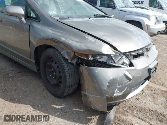 2006 Honda Civic LX z VIN 2HGFA16576H524297, wystawiony jako IAAI lot #42205155 z przebiegiem 173 763 mil mil oraz . Historia ofert i sprzedaży dostępna na DreamBid. Obrazek 6.
