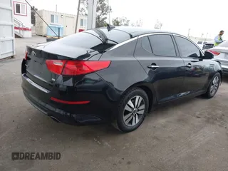 2014 Kia Optima LX with VIN 5XXGM4A7XEG280084, listed as a IAAI auction lot 42063263 with 168,052 mi miles. Bid and sale history available at carsss.com. Image 4.