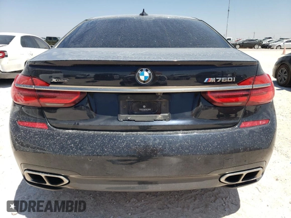 2018 BMW 7 Series M760i xDrive with VIN WBA7H6C51JG614580, listed as a Copart auction lot 65748304 with 46,801 mi miles and Clean Title. Bid and sale history available at carsss.com. Image 6.