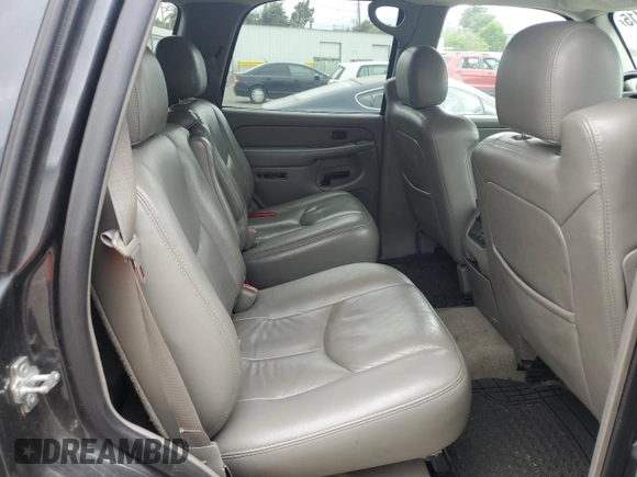 2005 Chevrolet Tahoe Z71 with VIN 1GNEC13T85R141076, listed as a Copart auction lot 54733415 with 310,992 mi miles and Salvage title. Bid and sale history available at DreamBid. Image 11.