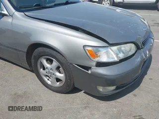 1998 Lexus ES 300 with VIN JT8BF28G3W5031533, listed as a IAAI auction lot 42132801 with 243,178 mi miles and . Bid and sale history available at DreamBid. Image 12.