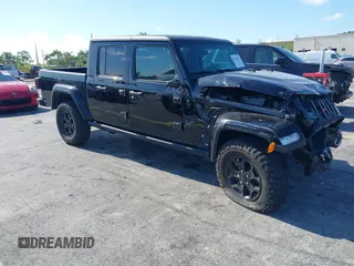 2021 Jeep Gladiator Willys с VIN 1C6HJTAGXML613431, выставлен на аукционе IAAI как лот 42180502 с пробегом 64 572 миль миль и . История ставок и продаж доступна на DreamBid. Изображение 1.