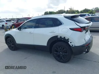 2022 Mazda CX-30 2.5 Turbo Premium Package with VIN 3MVDMBDY3NM437897, listed as a IAAI auction lot 41715776 with 42,771 mi miles. Bid and sale history available at carsss.com. Image 14.