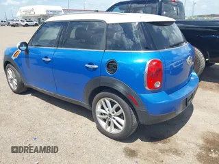 2014 MINI Countryman with VIN WMWZB3C52EWR40215, listed as a IAAI auction lot 42687571 with 106,338 mi miles and . Bid and sale history available at DreamBid. Image 3.