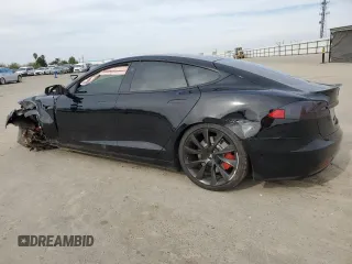2020 Tesla Model S Performance with VIN 5YJSA1E49LF390948, listed as a Copart auction lot 47313715 with 95,143 mi miles and Salvage title. Bid and sale history available at DreamBid. Image 2.