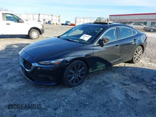 2018 Mazda Mazda6 Touring with VIN JM1GL1VM4J1307304, listed as a IAAI auction lot 41556563 with 173,739 mi miles. Bid and sale history available at carsss.com. Image 2.