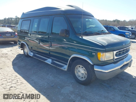 1999 Ford Econoline Cargo with VIN 1FDRE14W2XHB18989, listed as a IAAI auction lot 41740961 with 152,028 mi miles. Bid and sale history available at carsss.com. Image 1.