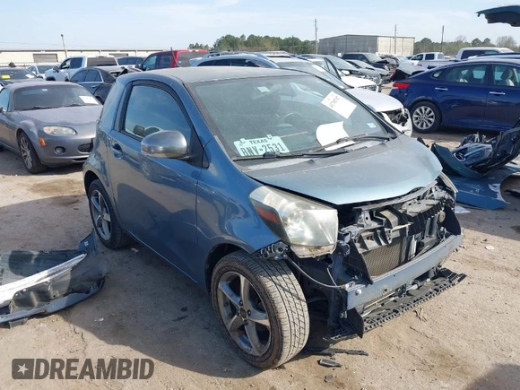 2012 Scion iQ with VIN JTNJJXB09CJ019082, listed as a IAAI auction lot 41798707 with 120,628 mi miles. Bid and sale history available at carsss.com. Image 1.