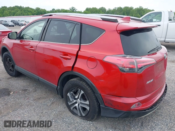 2017 Toyota RAV4 LE with VIN JTMBFREV8HJ161427, listed as a IAAI auction lot 42333851 with 121,161 mi miles and . Bid and sale history available at DreamBid. Image 3.