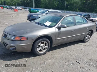 2001 Pontiac Bonneville SE z VIN 1G2HX54K514263686, wystawiony jako IAAI lot #42373637 z przebiegiem Nie podano mil oraz . Historia ofert i sprzedaży dostępna na DreamBid. Obrazek 2.