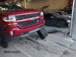 2018 Chevrolet Silverado 1500 LT with VIN 3GCUKREC0JG580317, listed as a IAAI auction lot 41868522 with 75,738 mi miles. Bid and sale history available at carsss.com. Image 18.